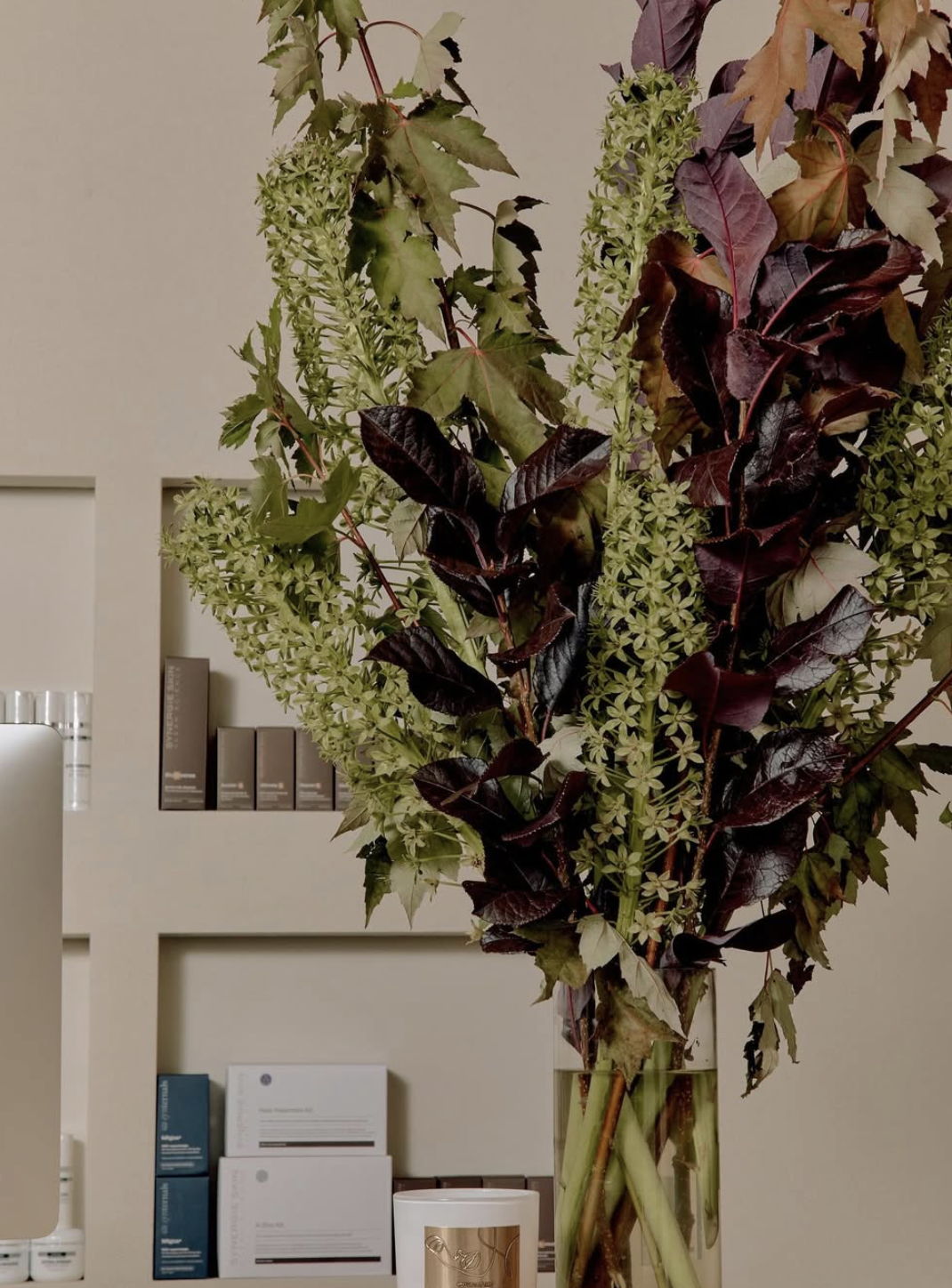 Styled florals and curated skincare details inside El Asilo